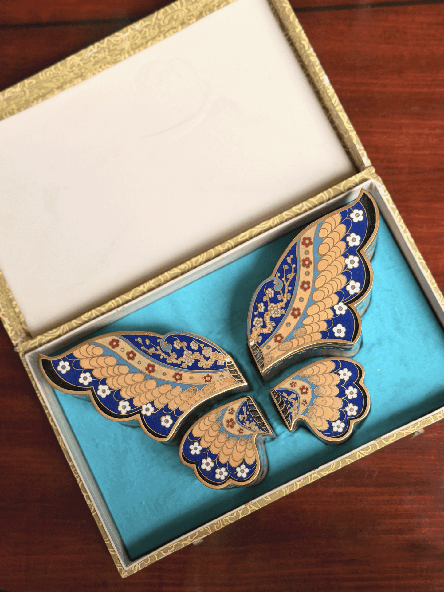 Decorative butterfly cloisonné trinket box in four segments sat in original, fabric lined presentation box