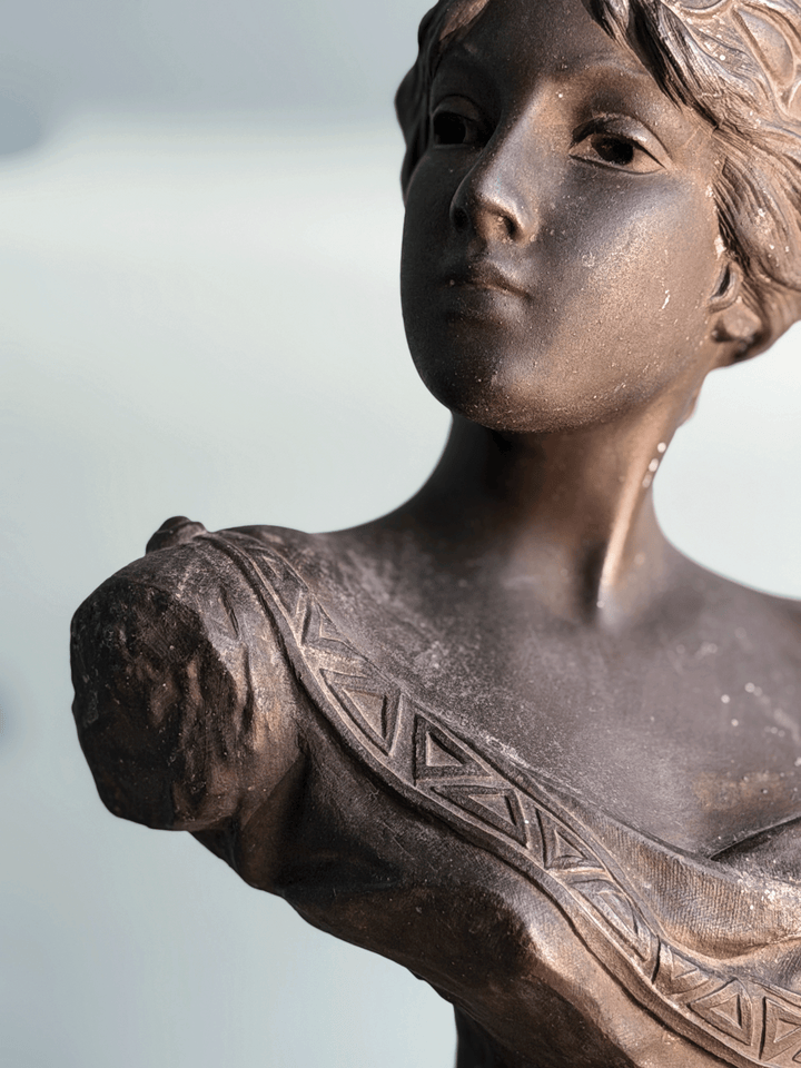 Antique Art Nouveau dark bronze spelter bust sculpture of the Greek goddess Circe with decorative coin headdress.