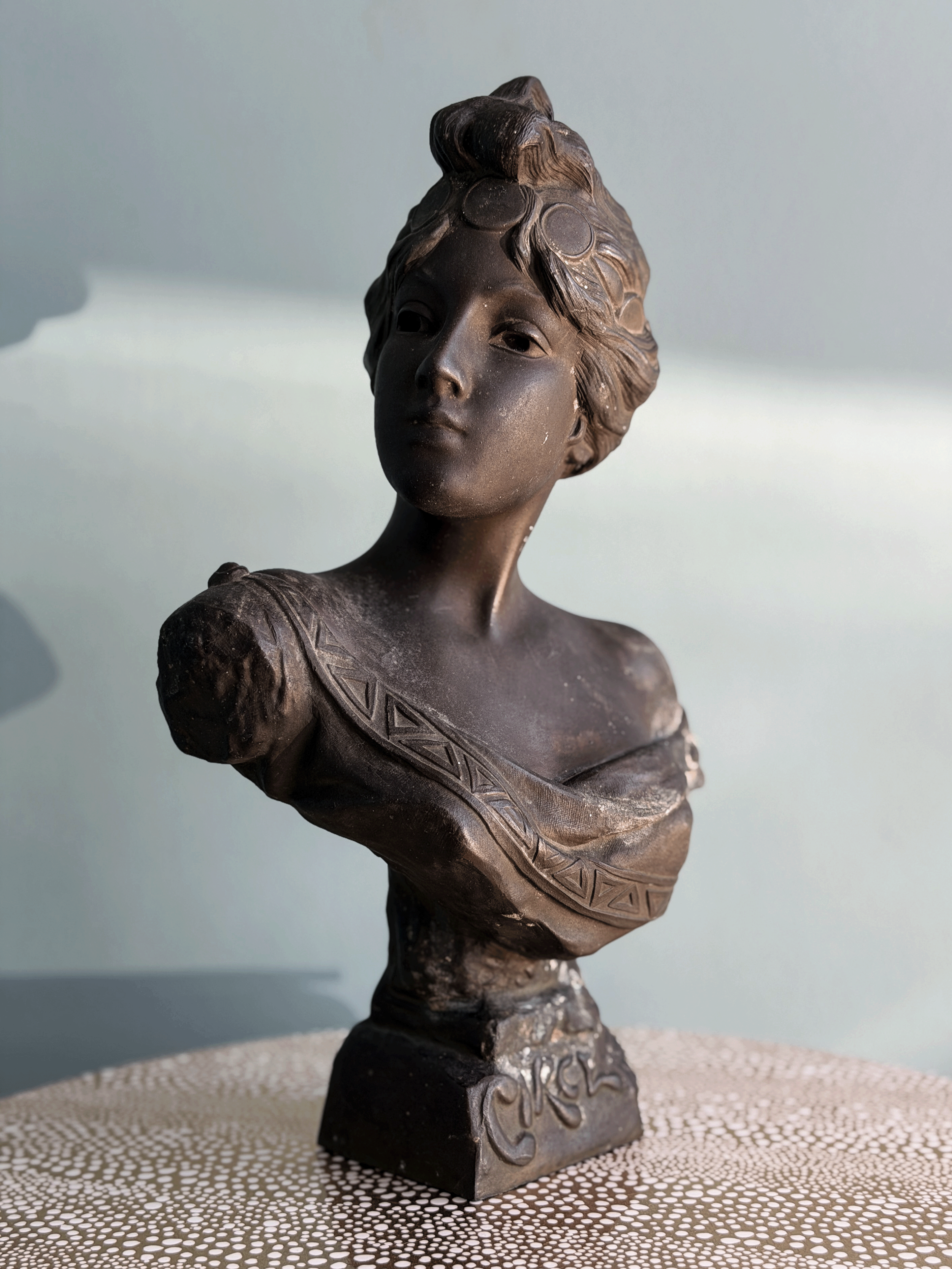 Antique Art Nouveau dark bronze spelter bust sculpture of the Greek goddess Circe with decorative coin headdress.