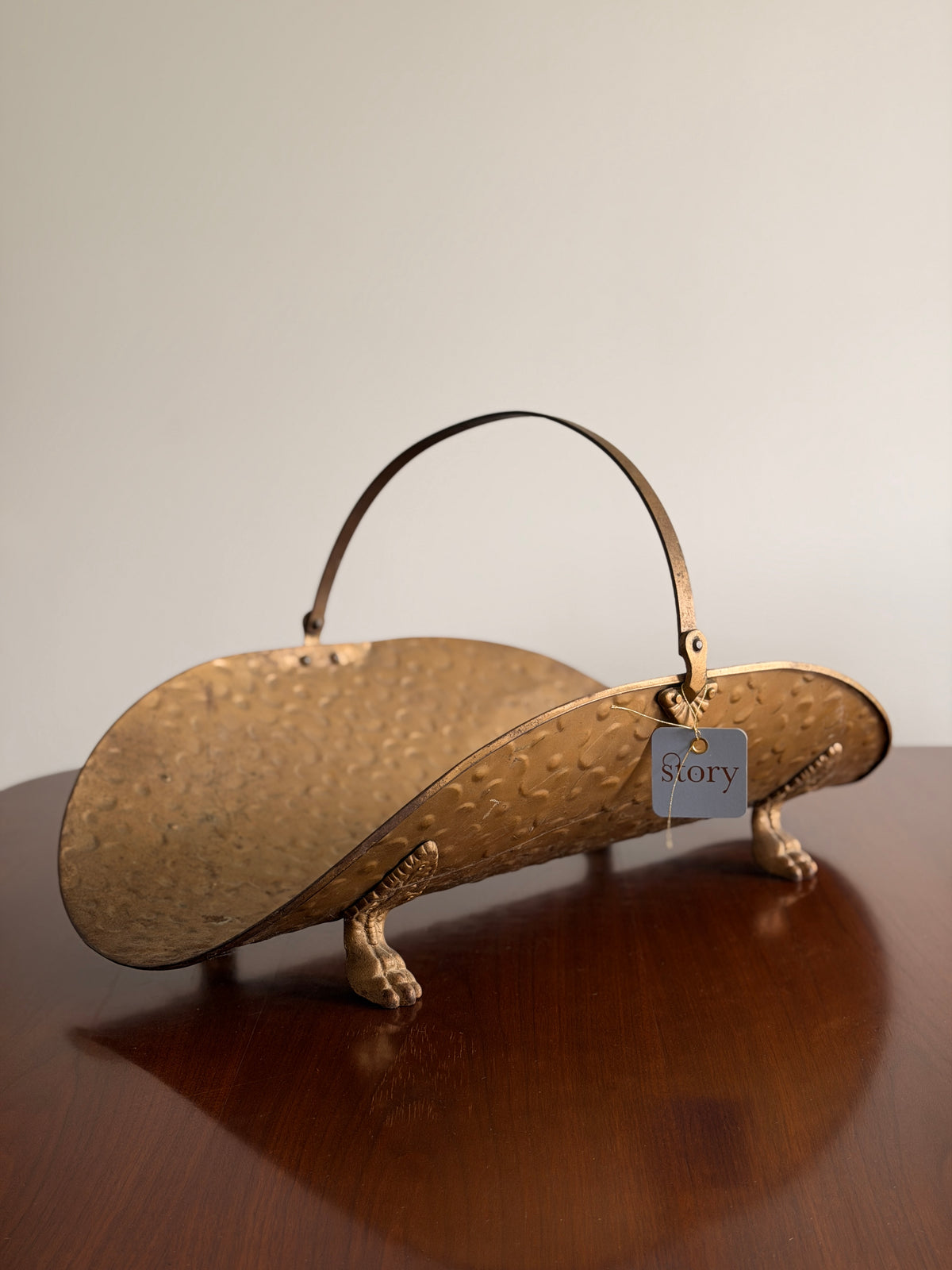 Brass footed fire wood holder