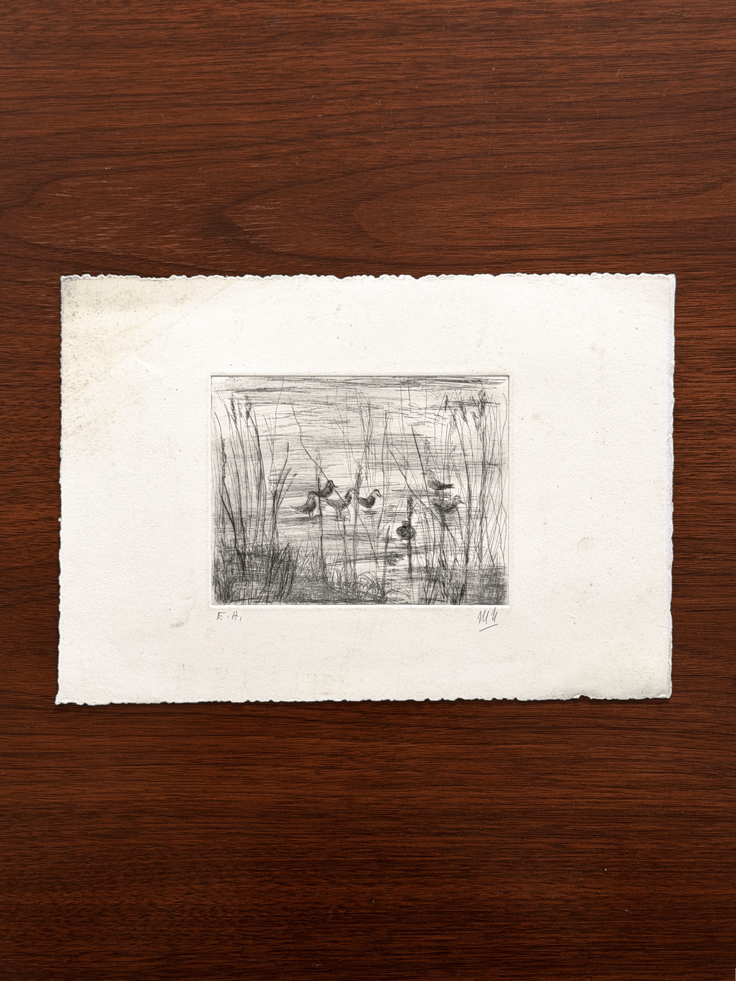 An original black and white intaglio etching printed on a rectangular sheet of white handmade paper with rough deckled edges.