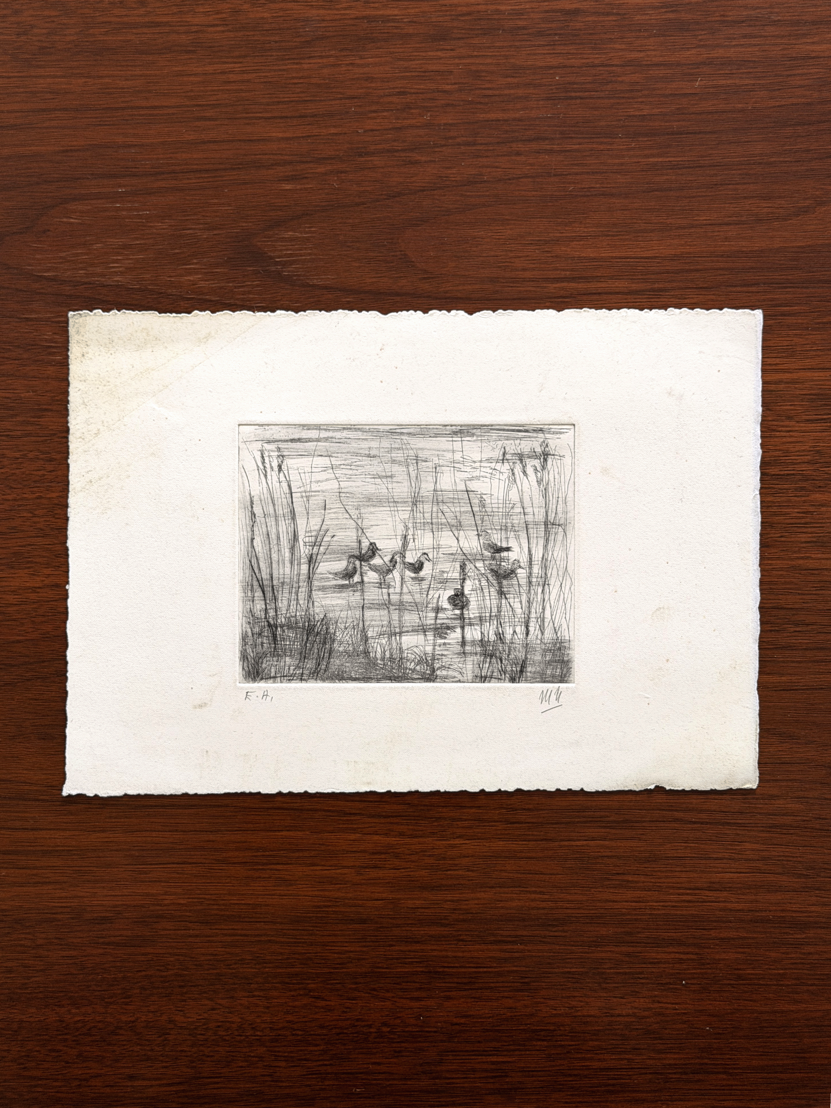 An original black and white intaglio etching printed on a rectangular sheet of white handmade paper with rough deckled edges.