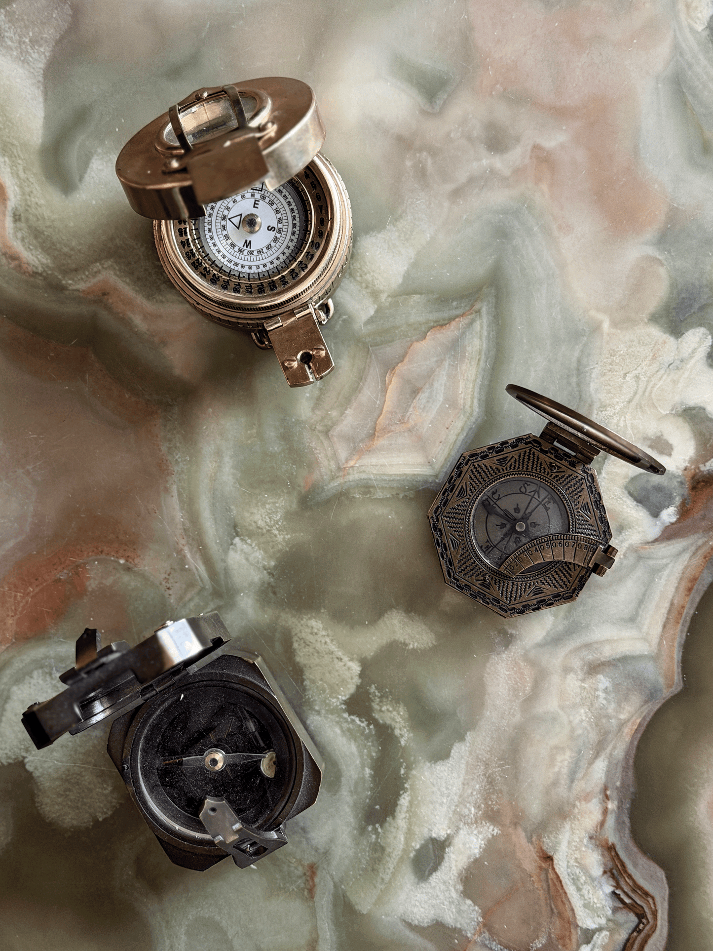 Three high quality reproduction compasses with working mechanisms
